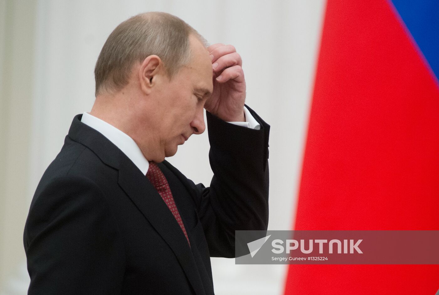 President Vladimir Putin presents state awards at the Kremlin