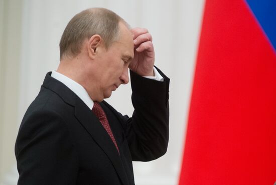 President Vladimir Putin presents state awards at the Kremlin