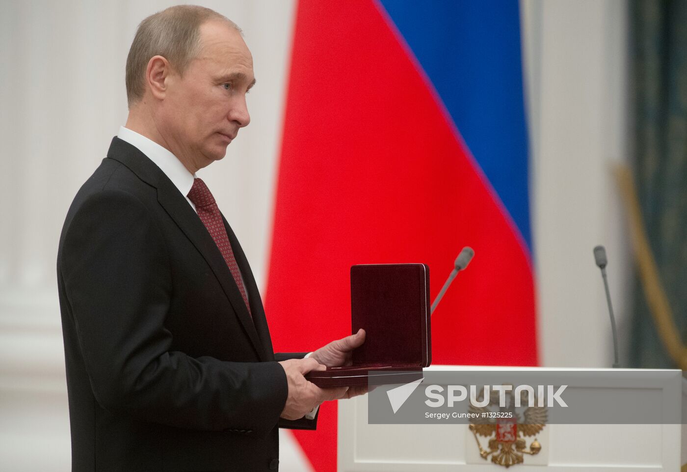 President Vladimir Putin presents state awards at the Kremlin