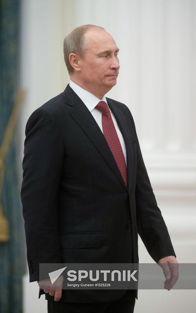 President Vladimir Putin presents state awards at the Kremlin