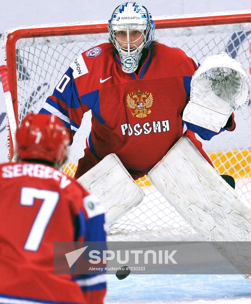 Russian player Yaroslav Kosov during warm-up before the quarterfinal match of the youth World Hockey Championship between the national teams of Russia and Switzerland. Location: Russia, Republic of Bashkortostan, Ufa. Author: Alexey Kudenko/Sputnik. Hockey Youth World Championship. Quarterfinal Russia-Switzerland