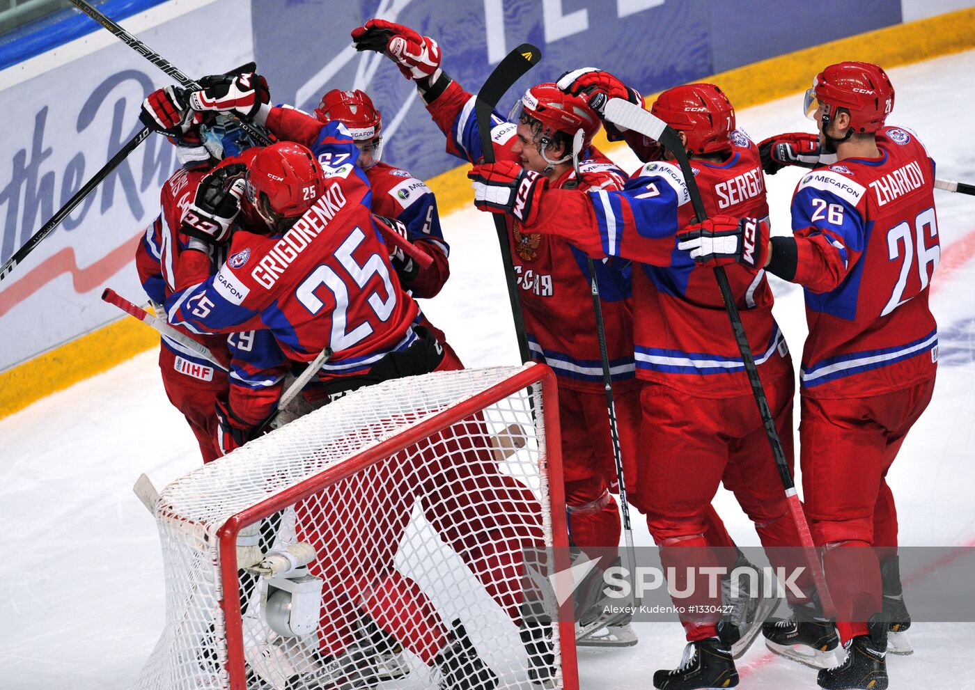 Russia's players happy about their victory in the quarterfinals of the World Junior Ice Hockey Championships. Russia vs. Switzerland. Location: Russia, Republic of Bashkortostan, Ufa. Author: Alexey Kudenko/Sputnik. World Junior Ice Hockey Championships. Quarterfinals