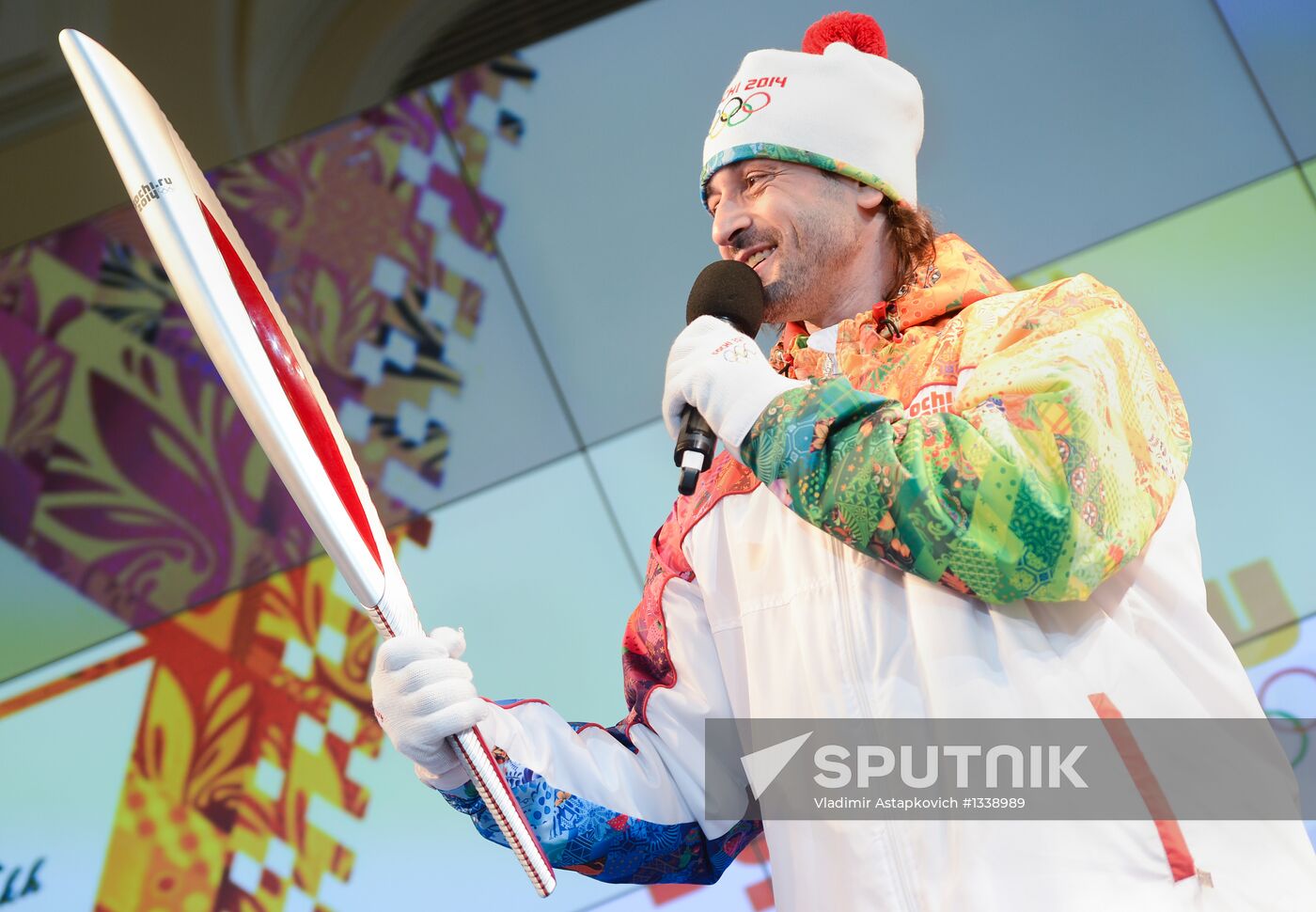 Olympic Flame Relay torch and uniform presented