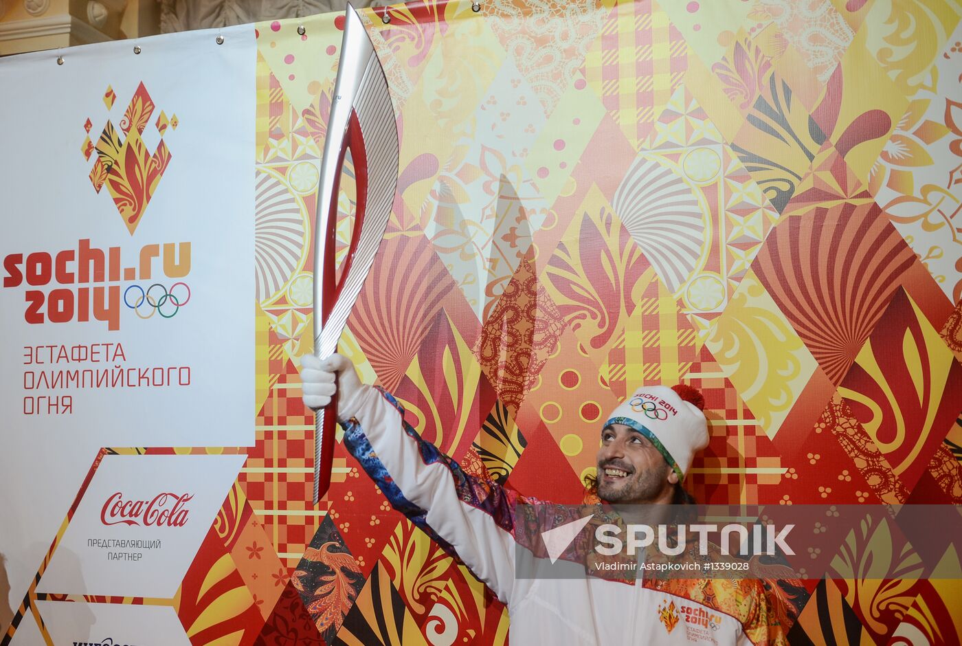 Olympic Flame Relay torch and uniform presented