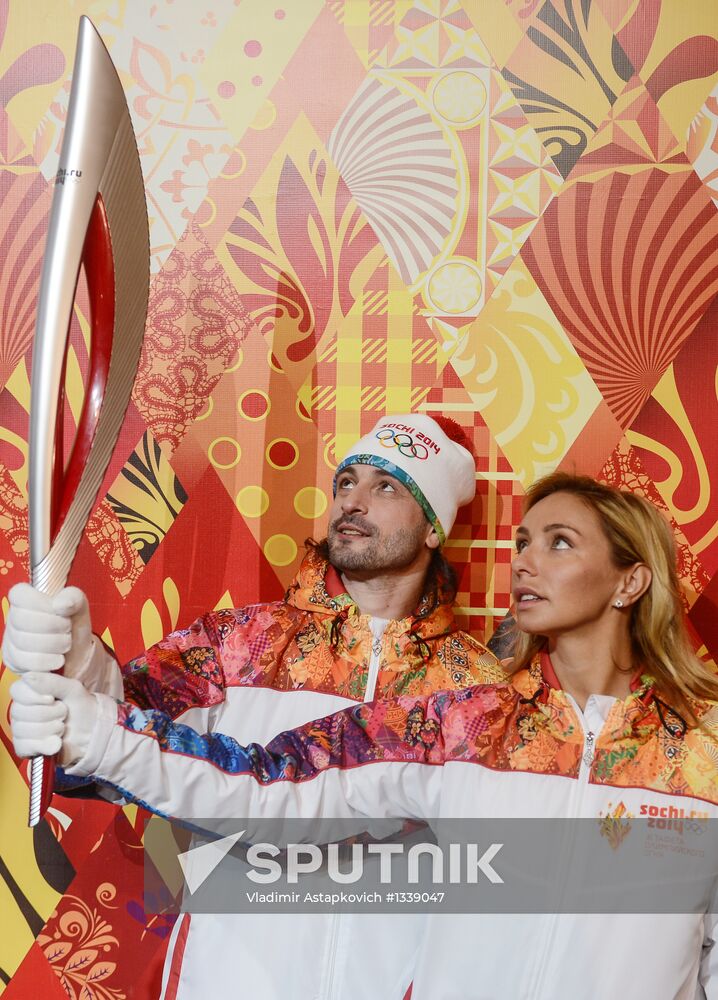 Olympic Flame Relay torch and uniform presented