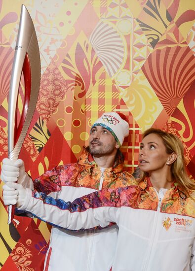 Olympic Flame Relay torch and uniform presented