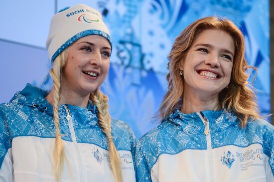Olympic Flame Relay torch and uniform presented