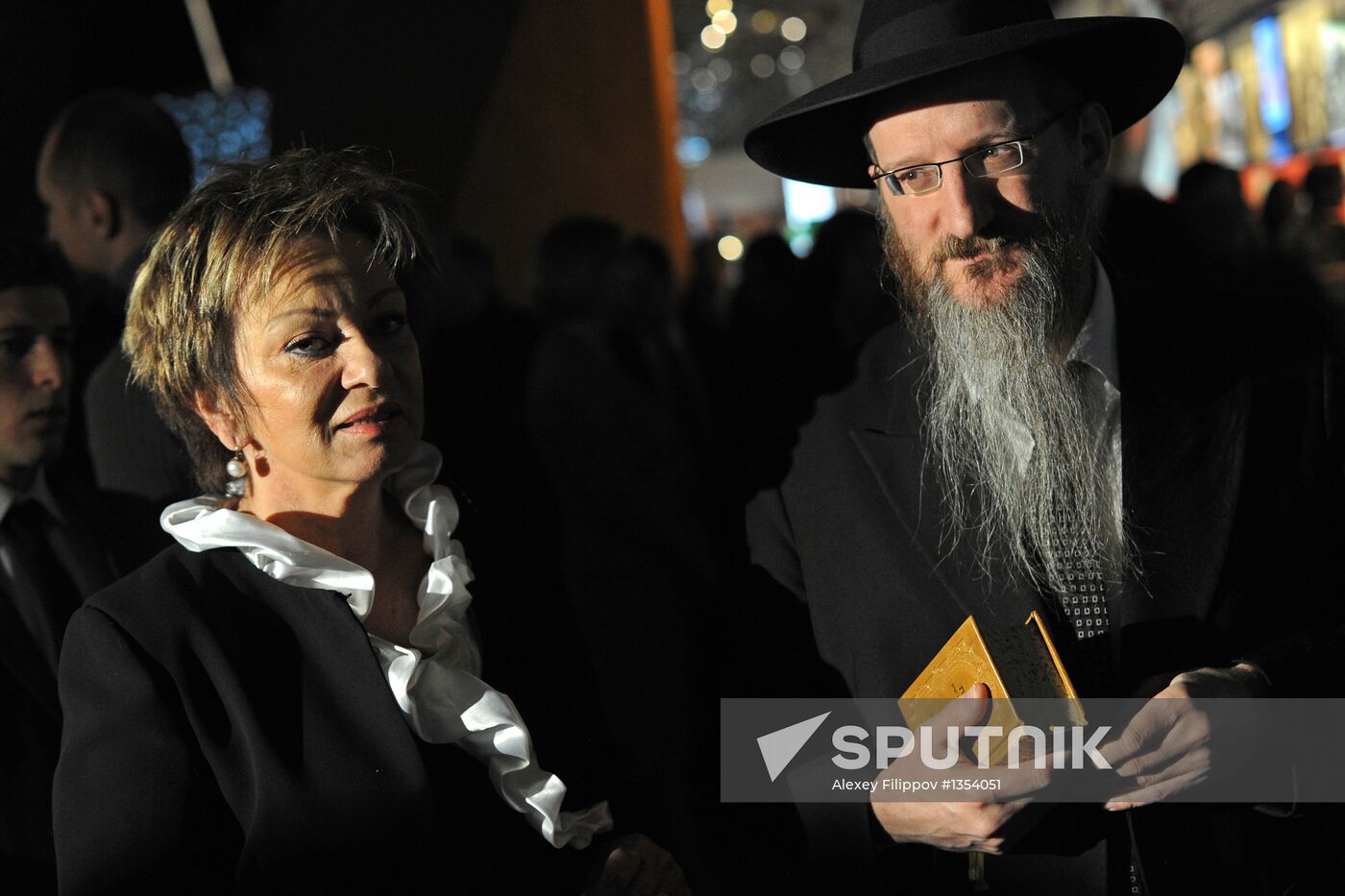 Lighting candles in memory of Holocaust victims