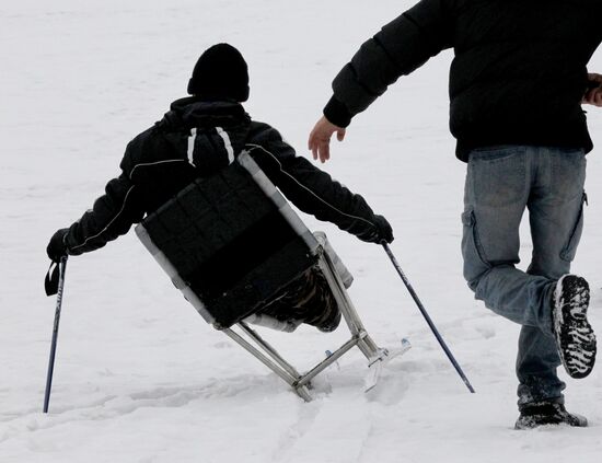 Disabled people training on the sit ski