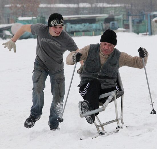 Disabled people training on the sit ski