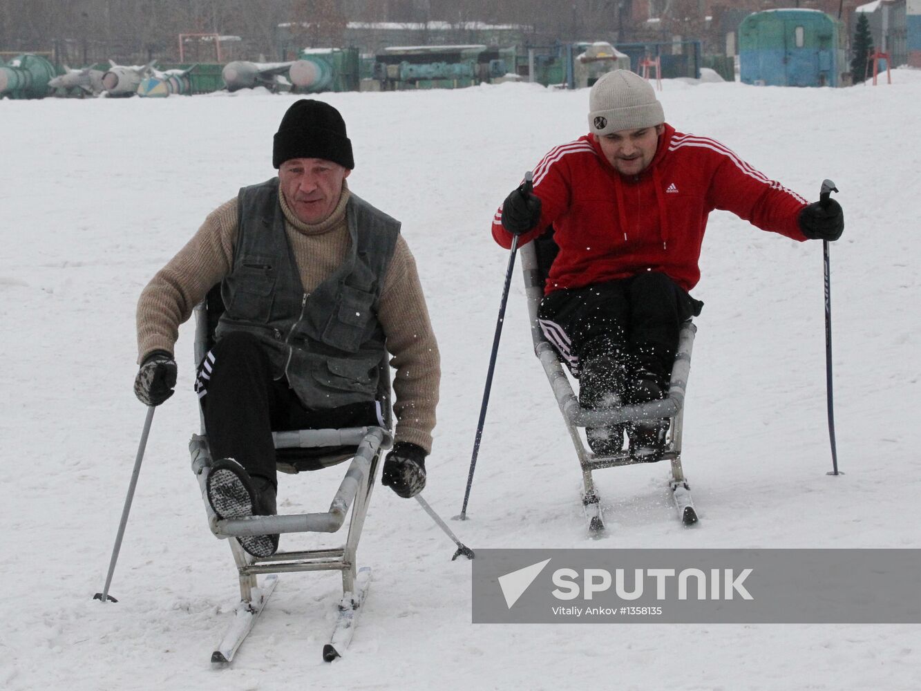 Disabled people training on the sit ski