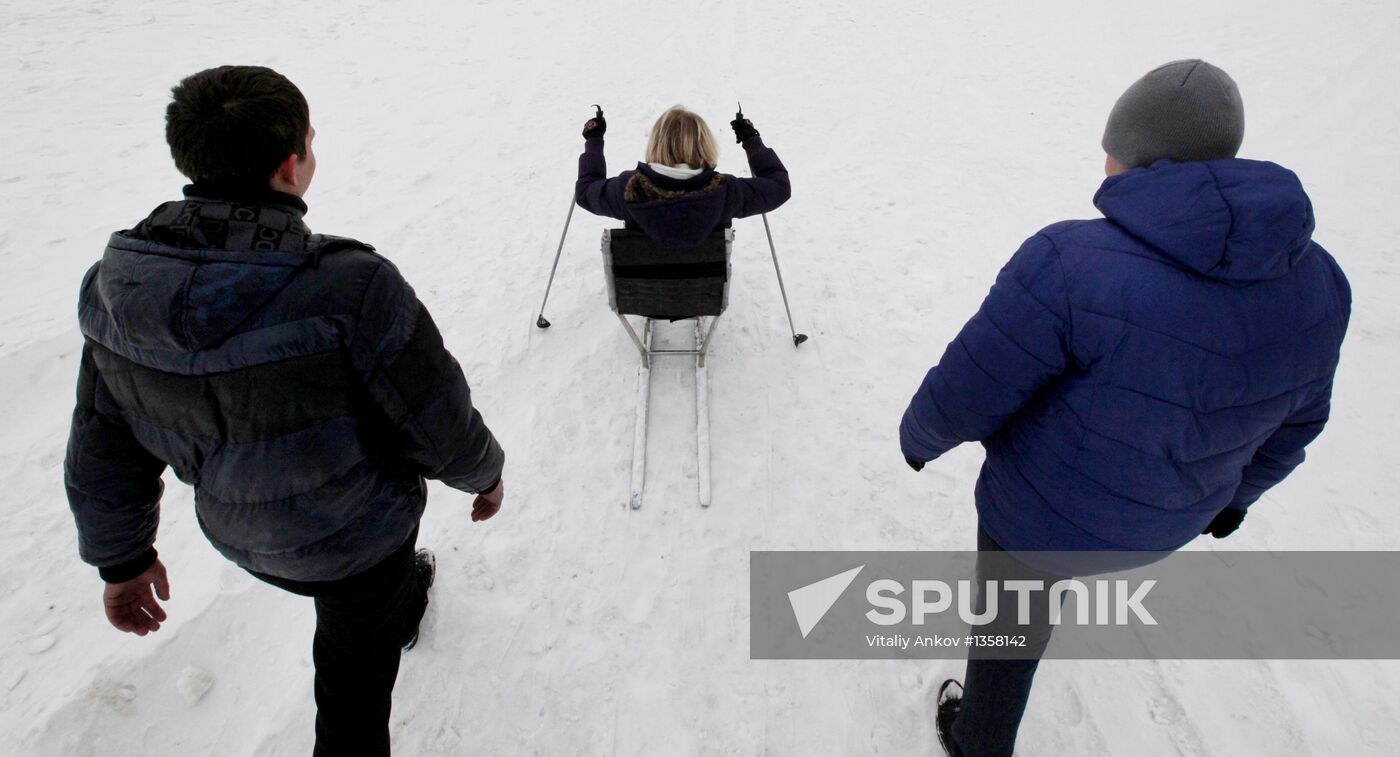 Disabled people training on the sit ski