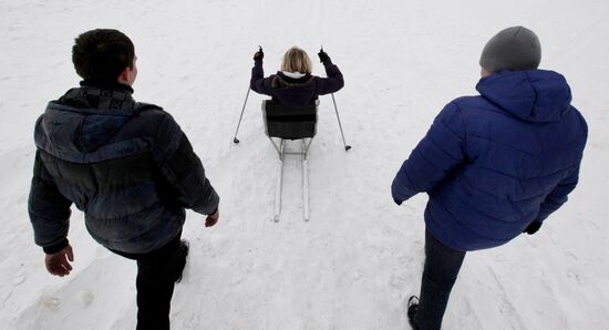 Disabled people training on the sit ski