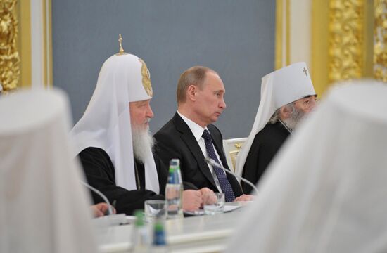Vladimir Putin meets with members of ROC Bishops' Council
