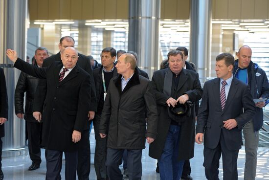 Vladimir Putin visits mountain-based Olympic facilities in Sochi