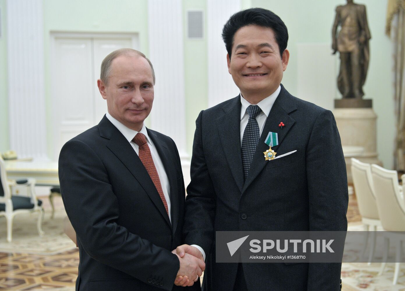 Vladimir Putin hands out state awards in Kremlin