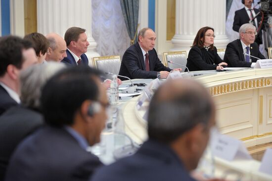 Vladimir Putin meets with G20 members