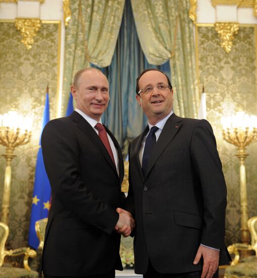 Vladimir Putin meets with Francois Hollande in the Kremlin