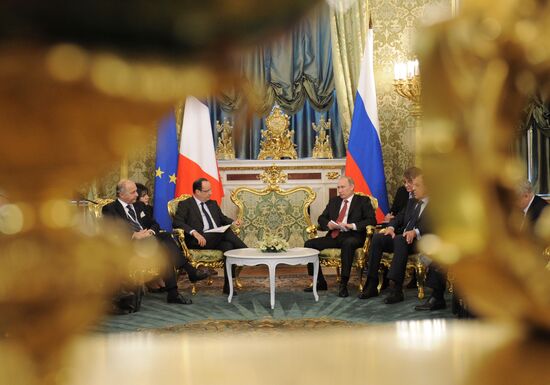 Vladimir Putin meets with Francois Hollande in the Kremlin