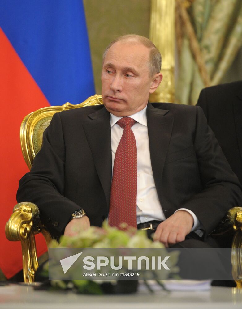 Vladimir Putin meets with Francois Hollande in the Kremlin