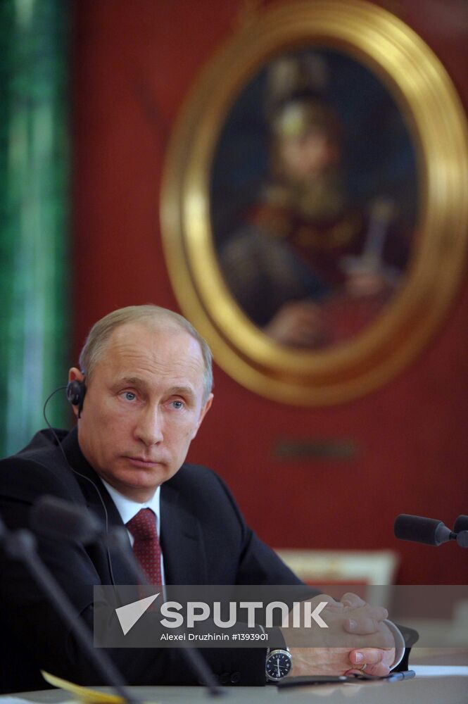 Vladimir Putin meets with Francois Hollande in the Kremlin
