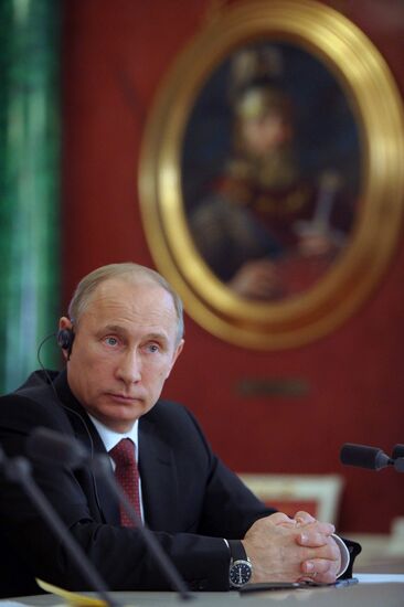 Vladimir Putin meets with Francois Hollande in the Kremlin