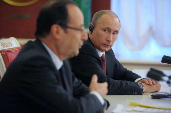 Vladimir Putin meets with Francois Hollande in the Kremlin