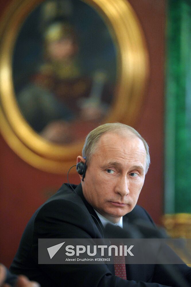 Vladimir Putin meets with Francois Hollande in the Kremlin
