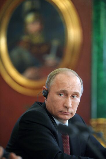 Vladimir Putin meets with Francois Hollande in the Kremlin