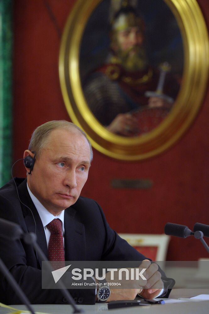 Vladimir Putin meets with Francois Hollande in the Kremlin