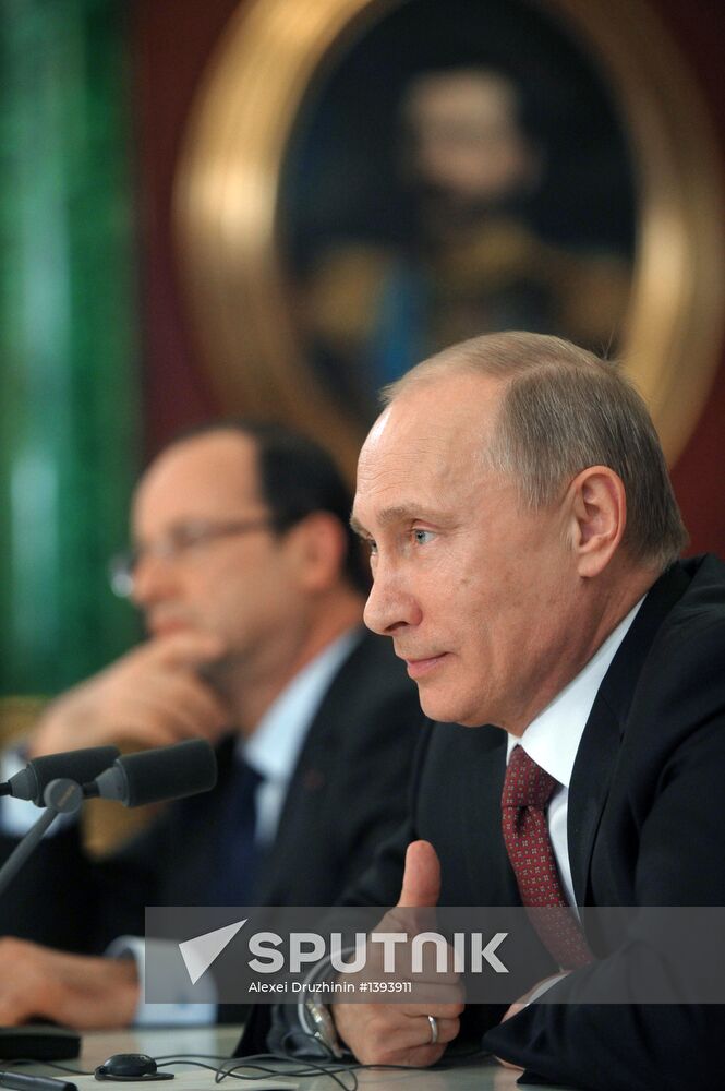 Vladimir Putin meets with Francois Hollande in the Kremlin