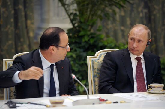 Vladimir Putin meets with Francois Hollande in the Kremlin