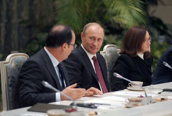 Vladimir Putin meets with Francois Hollande in the Kremlin