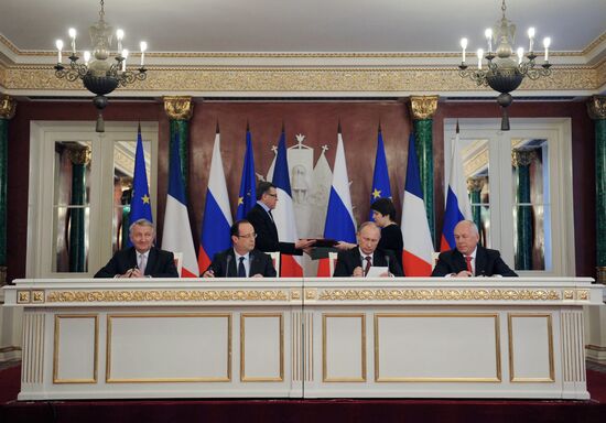 Vladimir Putin meets with Francois Hollande in the Kremlin