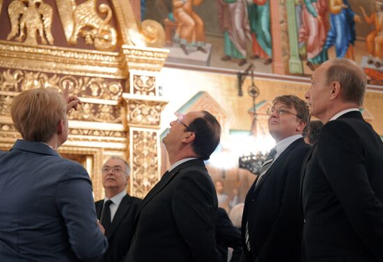 Vladimir Putin meets with Francois Hollande in the Kremlin