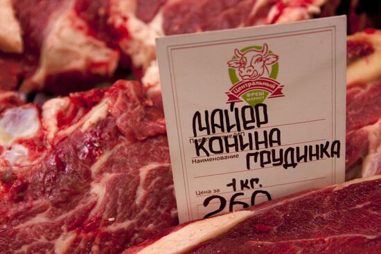 Selling meat at markets
