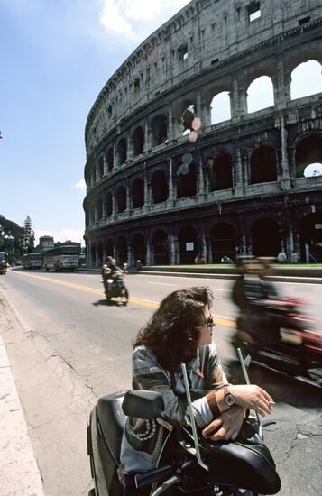 ROME COLOSSEUM MOTORCYCLISTS