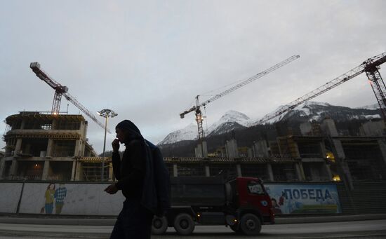 Workers at construction site of Gorki Gorod Olympic facility