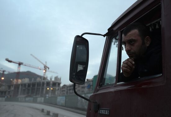 Workers at construction site of Gorki Gorod Olympic facility