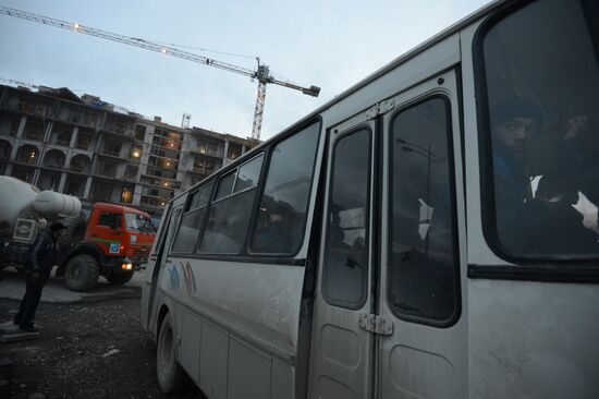 Workers at construction site of Gorki Gorod Olympic facility