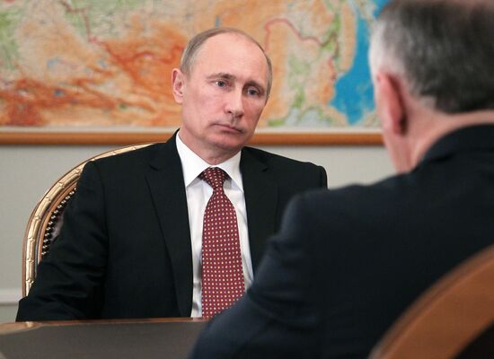 Russian President Vladimir Putin meets with Viktor Ivanov