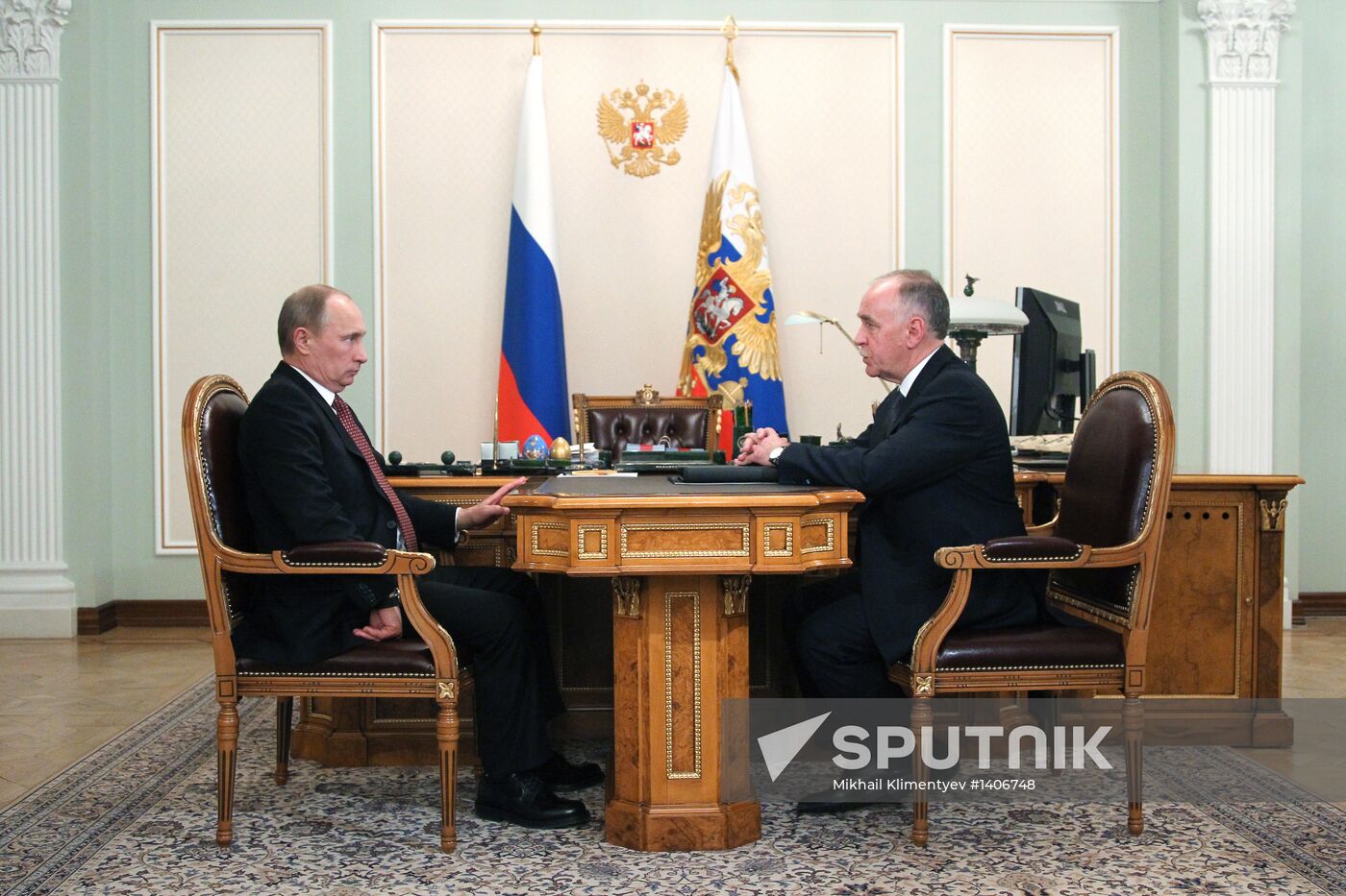 Russian President Vladimir Putin meets with Viktor Ivanov