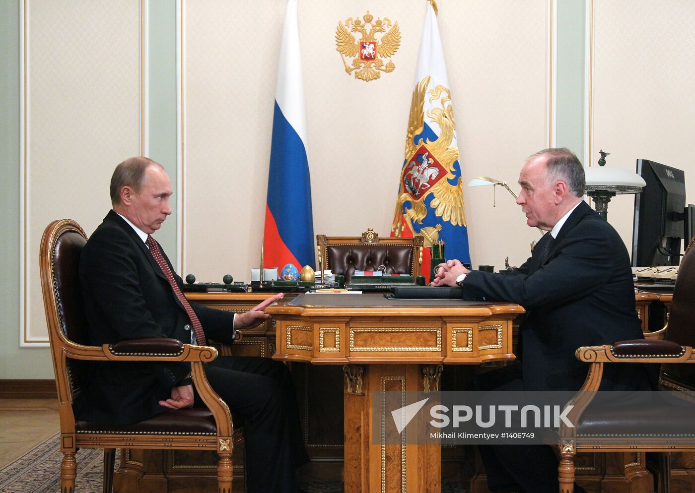 Russian President Vladimir Putin meets with Viktor Ivanov