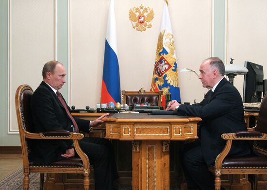 Russian President Vladimir Putin meets with Viktor Ivanov