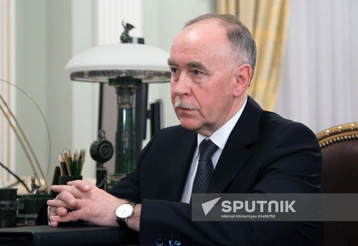 Russian President Vladimir Putin meets with Viktor Ivanov