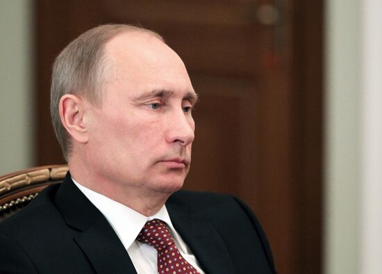 Russian President Vladimir Putin meets with Viktor Ivanov