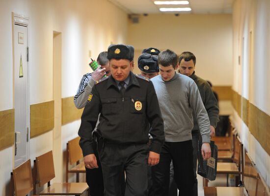 Former policemen under trial