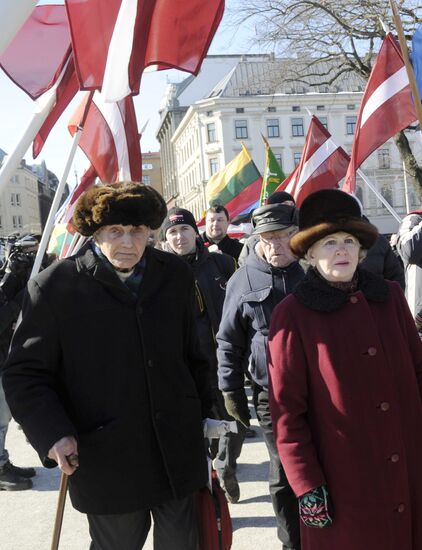 Latvian Waffen-SS Legion veterans march in Riga