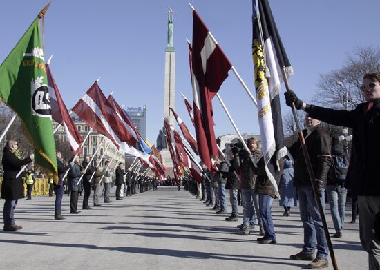 Latvian Waffen-SS Legion veterans march in Riga