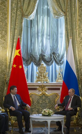 Vladimir Putin meets with Xi Jinping